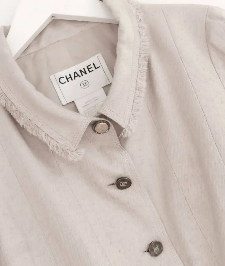 Chanel women’s beige silk vintage jacket with raw fringed hems