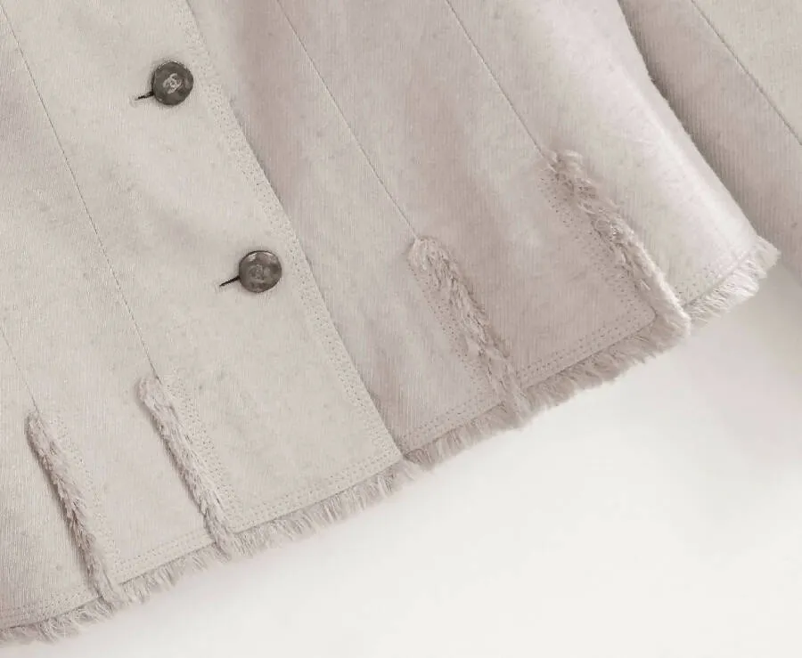 Chanel women’s beige silk vintage jacket with raw fringed hems