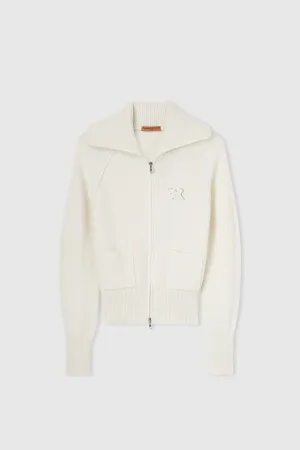 Knitted sweatshirt with zip and pockets.