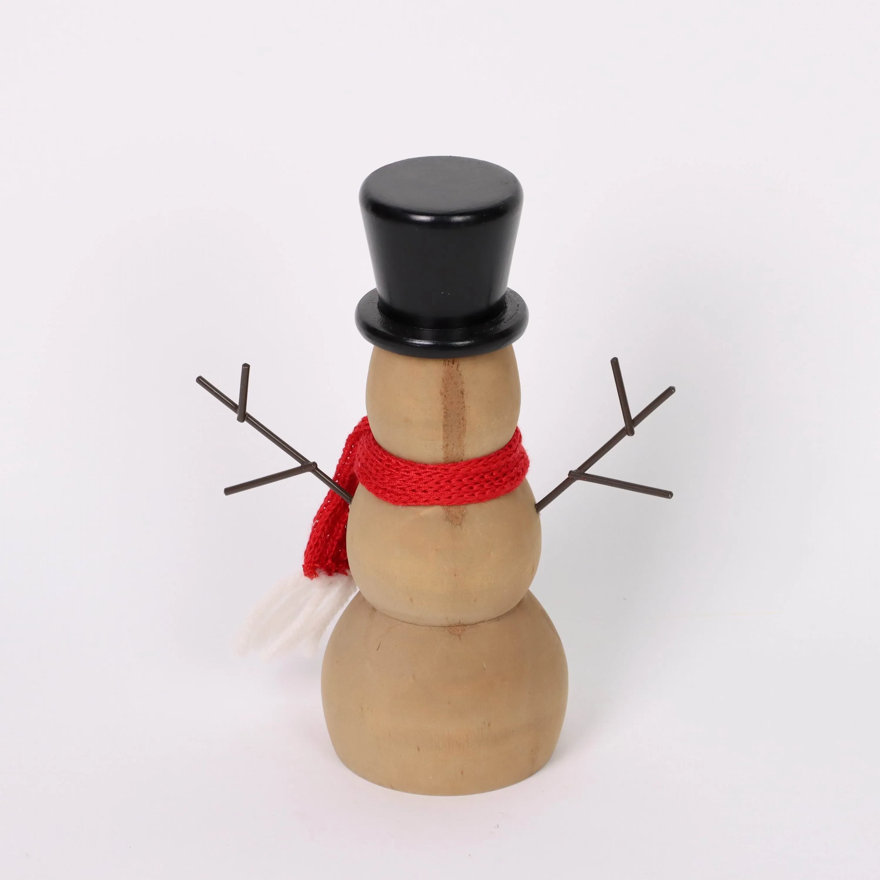 Wooden snowman with red knitted scarf